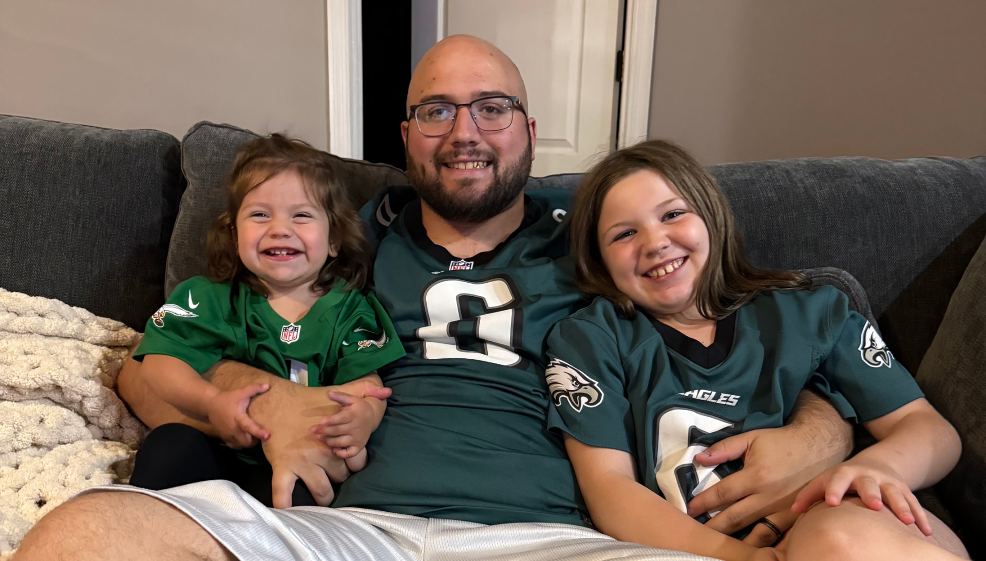 Joe with his daughters Contessa and Aria at home in Clay County, Florida